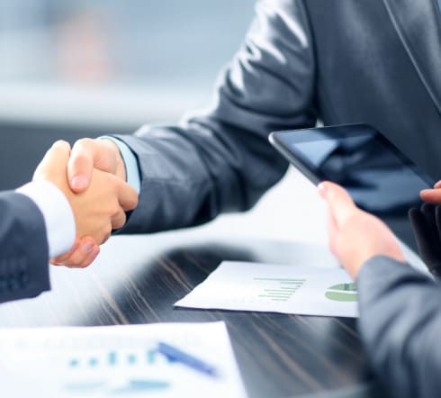 image of two people shaking hands after the purchase of a Surety Bond for their Franklin, TN Business.